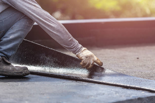 Professional Waterproofing technician working in Martinsville, VA